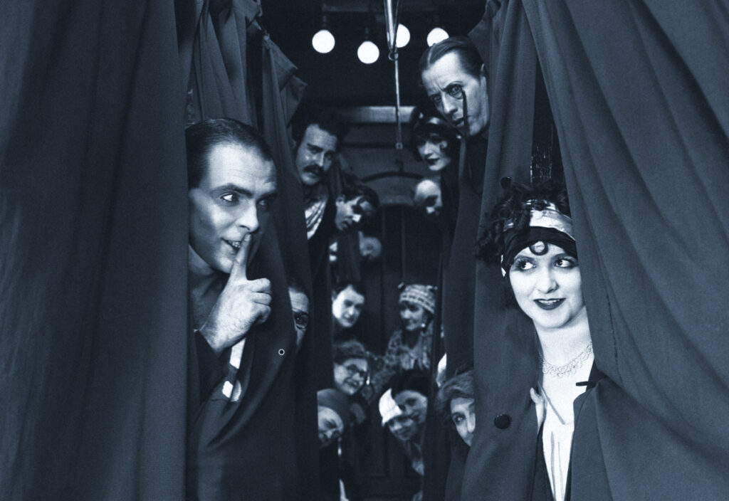 Black and white vintage photograph featuring a group of people peeking from behind curtains, embodying elements of surprise and intrigue. This captures the essence of mysterious storytelling and engagement relevant to gamification in small business marketing.